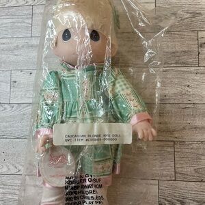 Precious Moments Doll in Green and Pink Outfit